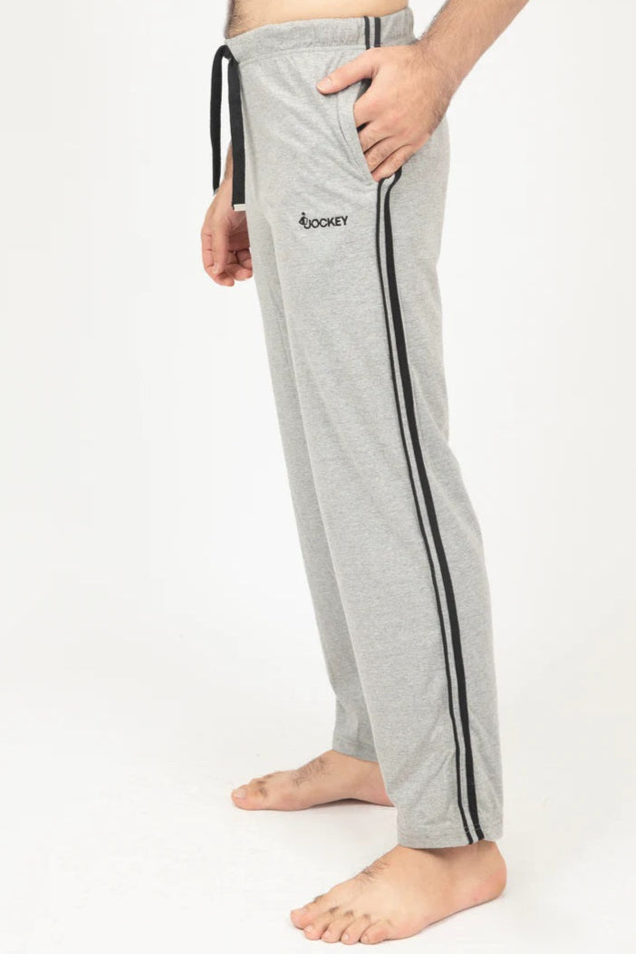 Gray sweatpants with black stripes and a brand logo on a white background